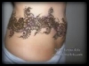 Henna design on various body parts covered and uncovered