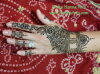 Modern unique mehndi designs for teens by Nisha Henna Arts