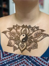 Henna art above the chest