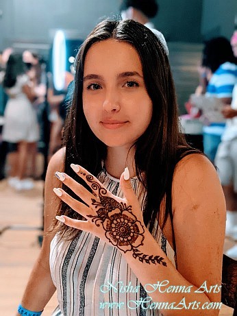 Student with henna on a project graduation celebration in Austin