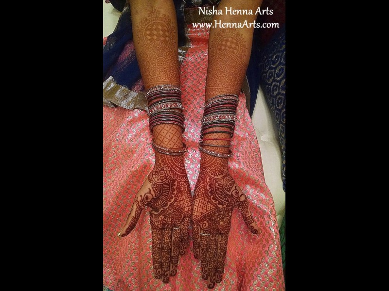 complex and intricate henna design by Nisha HennaArts Austin